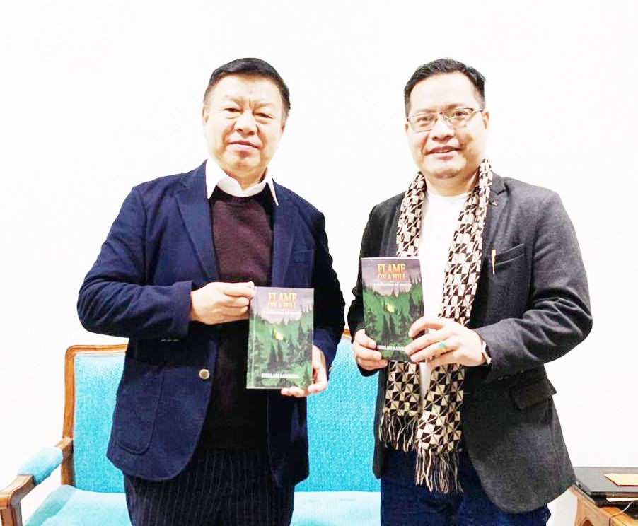 Book titled ‘Flame Of A Fire: A Collection Of Stories’ written by Shelmi Sankhil released by Dr Lorho S Pfoze, Member of Parliament, Lok Sabha for Outer Constituency, Manipur on January 23. (Photo Courtesy: NSA)